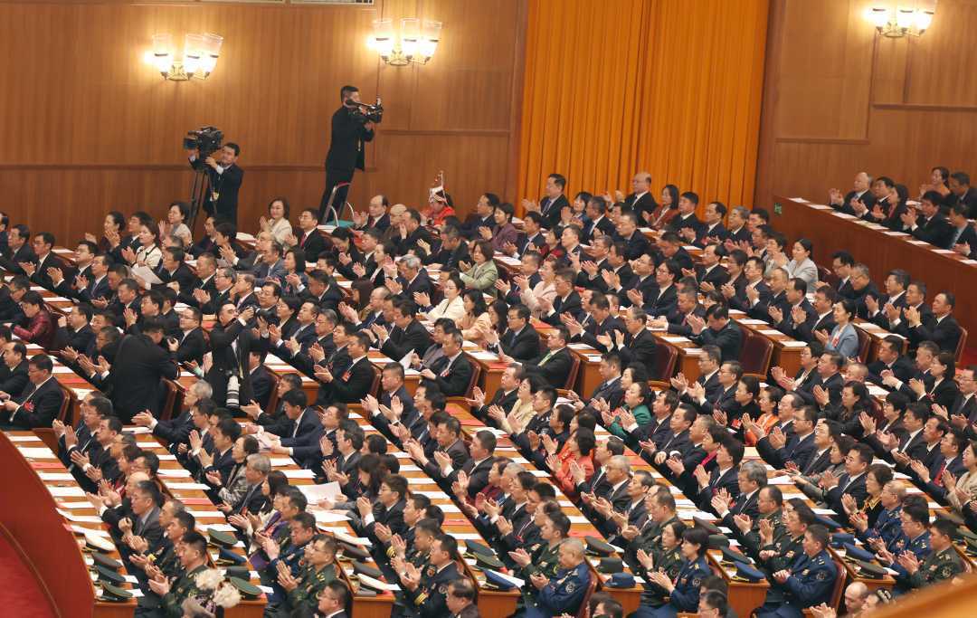 组图丨十四届全国人大三次会议举行闭幕会